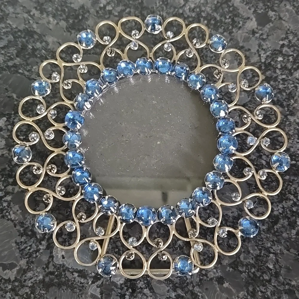 Gold Metal Round Frame Bedazzled with Blue Gem Stones